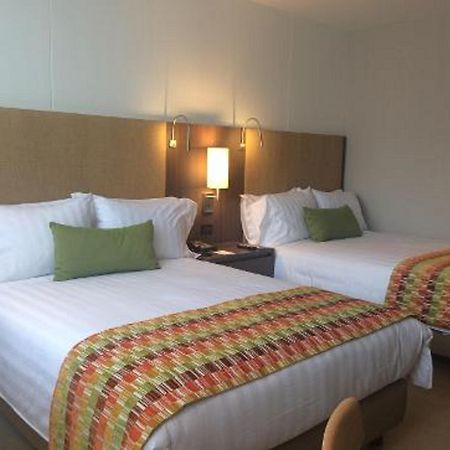Estelar Villavicencio Hotel & Centro De Convenciones Εξωτερικό φωτογραφία A room at the Hilton Garden Inn in San Francisco