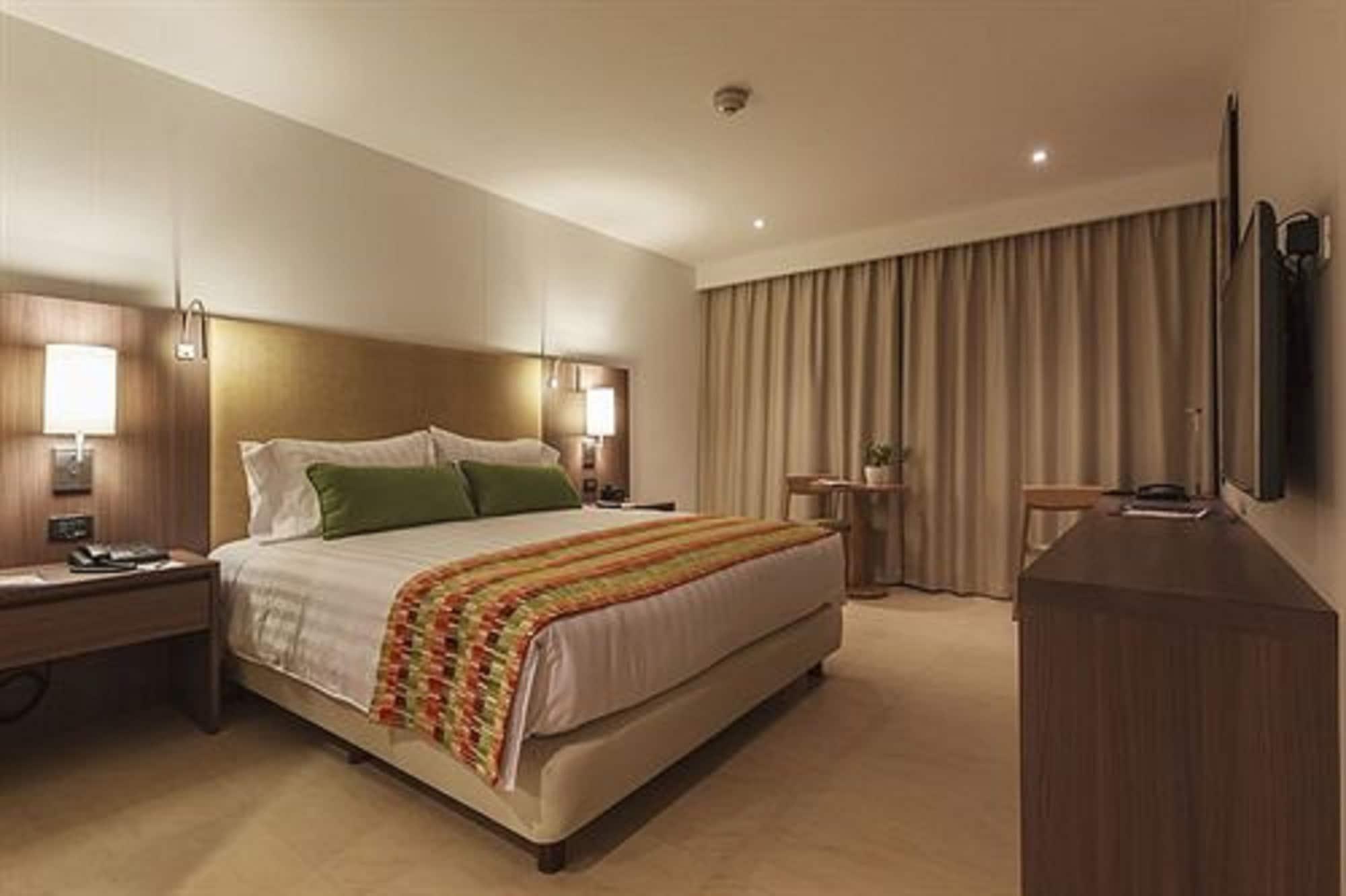 Estelar Villavicencio Hotel & Centro De Convenciones Εξωτερικό φωτογραφία A bedroom at the hotel