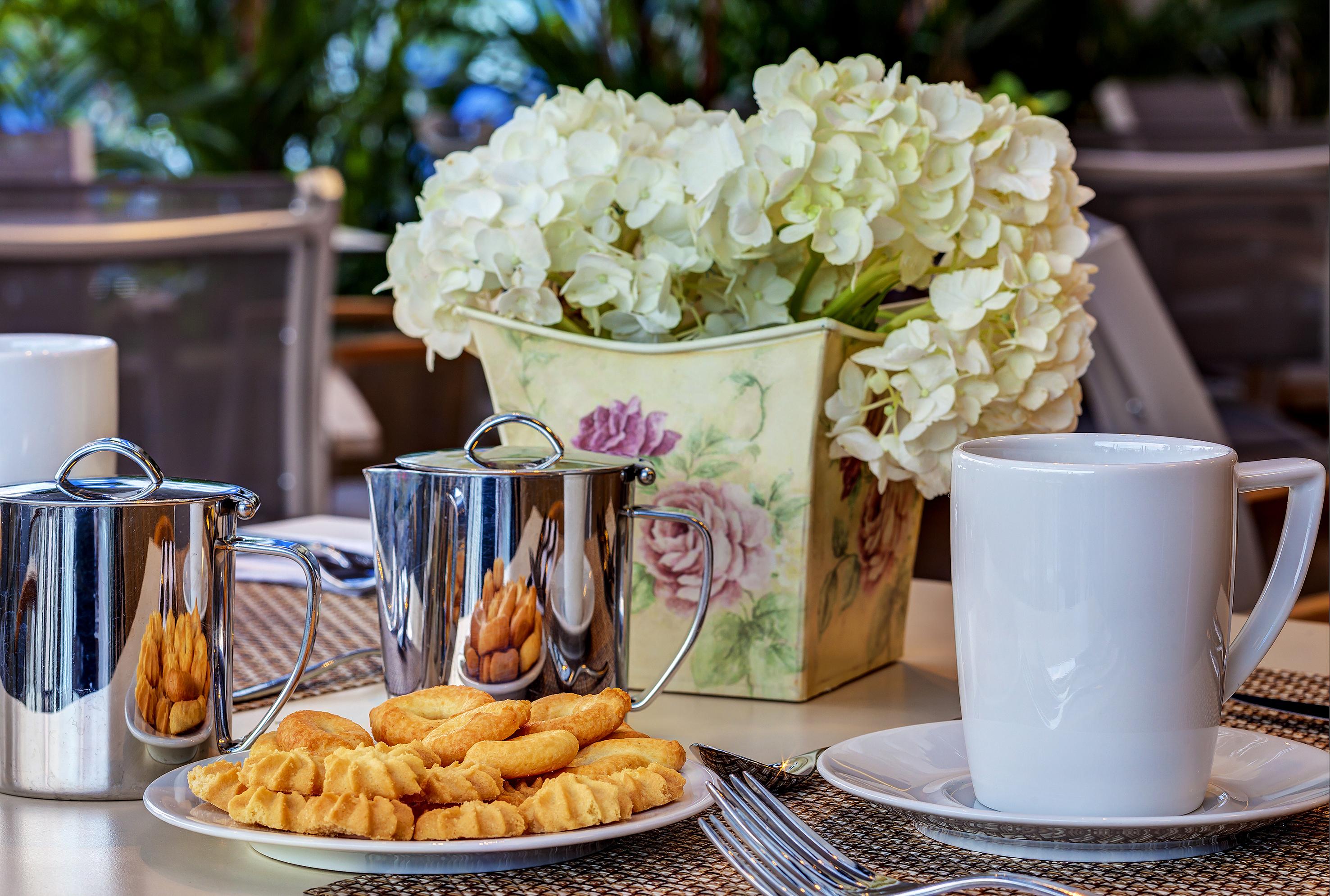 Estelar Villavicencio Hotel & Centro De Convenciones Εξωτερικό φωτογραφία A table at the restaurant