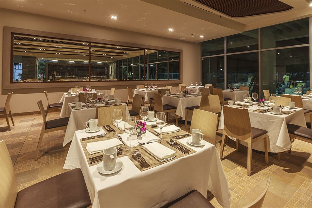 Estelar Villavicencio Hotel & Centro De Convenciones Εξωτερικό φωτογραφία The interior of the restaurant